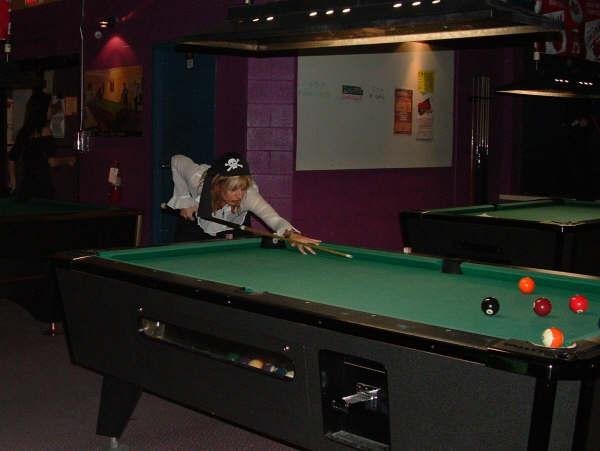 Kathy playing pool.JPG